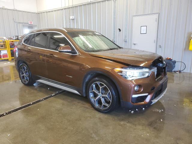Паркетники BMW X1 2016 Коричневий