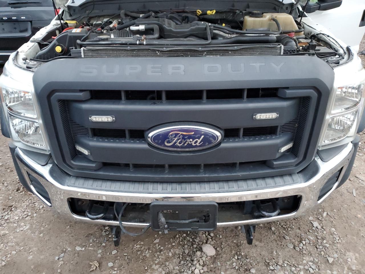 2012 Ford F550 Super Duty VIN: 1FD0X5HT1CEC58215 Lot: 77994144