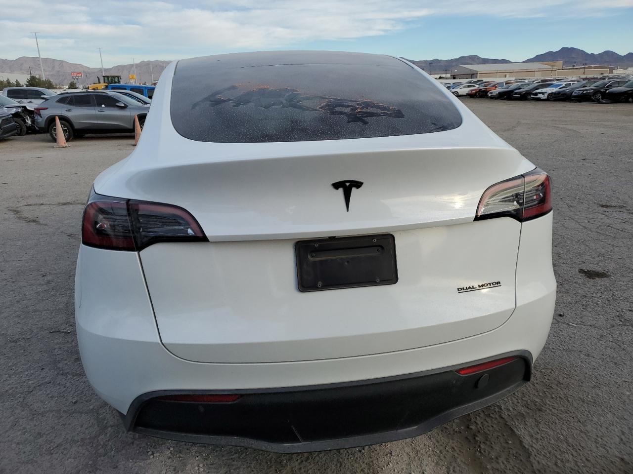 2023 Tesla Model Y VIN: 7SAYGDEE2PA113549 Lot: 81386554