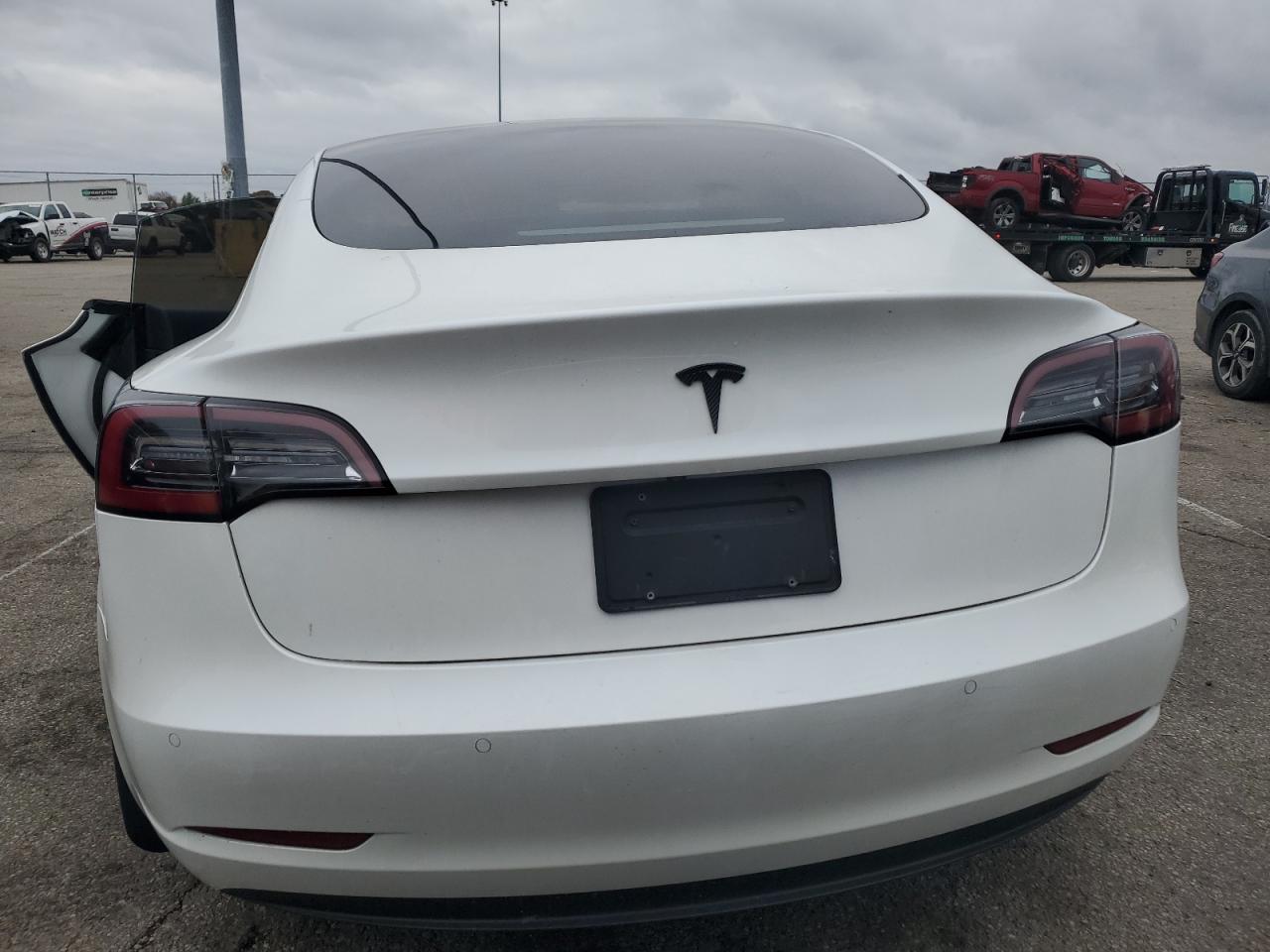 2022 Tesla Model 3 VIN: 5YJ3E1EB5NF183869 Lot: 80590184