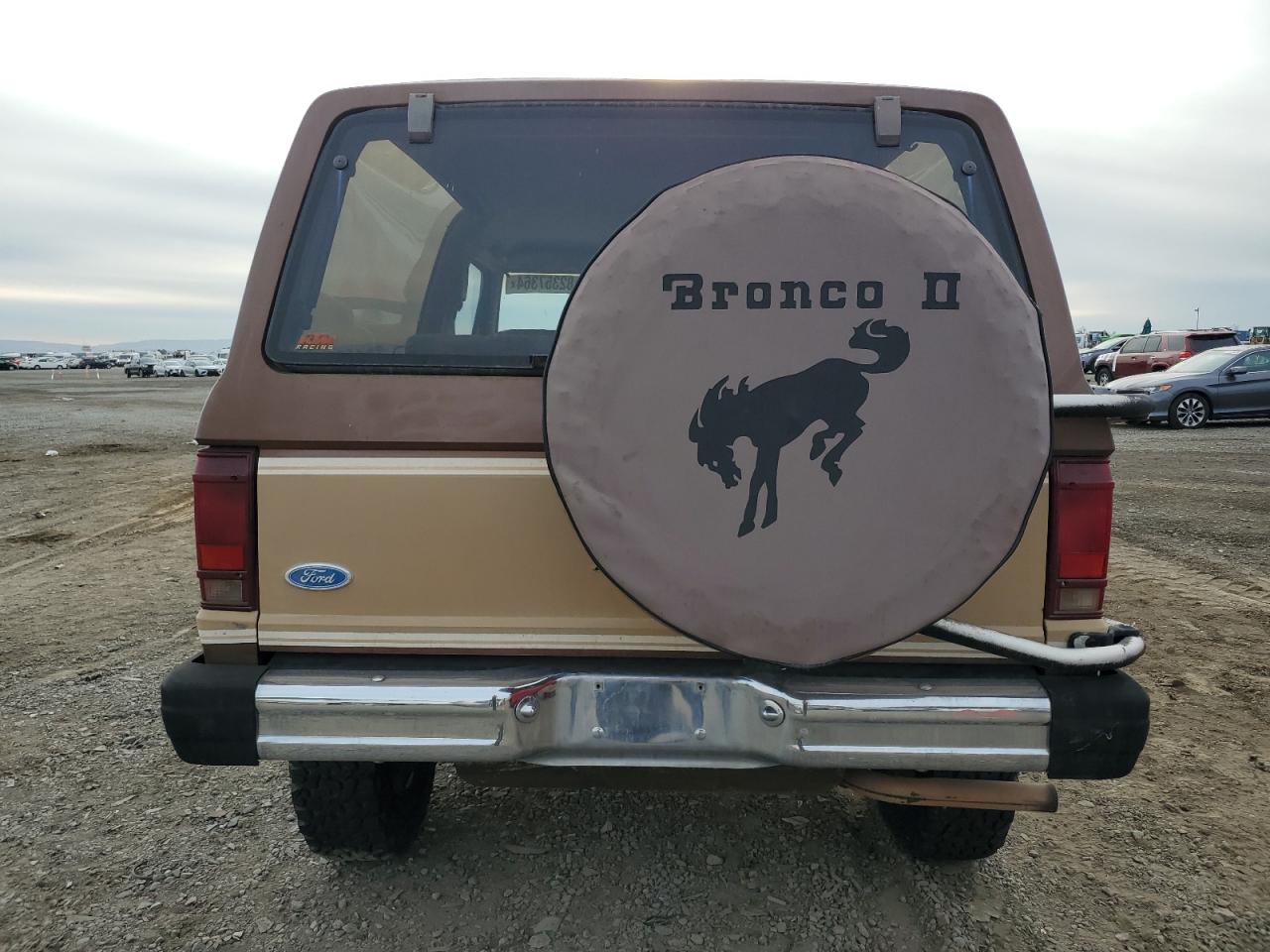 1984 Ford Bronco Ii VIN: 1FMCU14S9EUC27301 Lot: 82357364