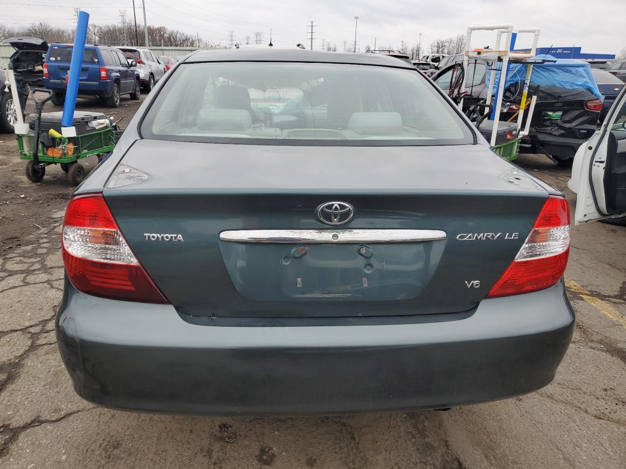 2002 Toyota Camry Le VIN: 4T1BF32K42U540806 Lot: 79926134