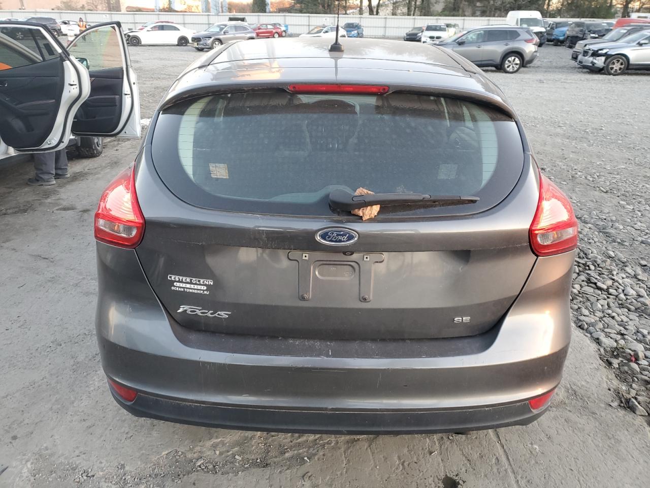 2018 Ford Focus Se VIN: 1FADP3K21JL324089 Lot: 80131994