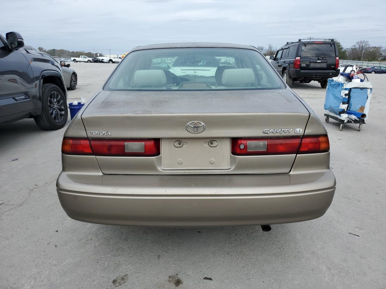 1999 Toyota Camry Le VIN: JT2BG28K9X0303612 Lot: 80715604