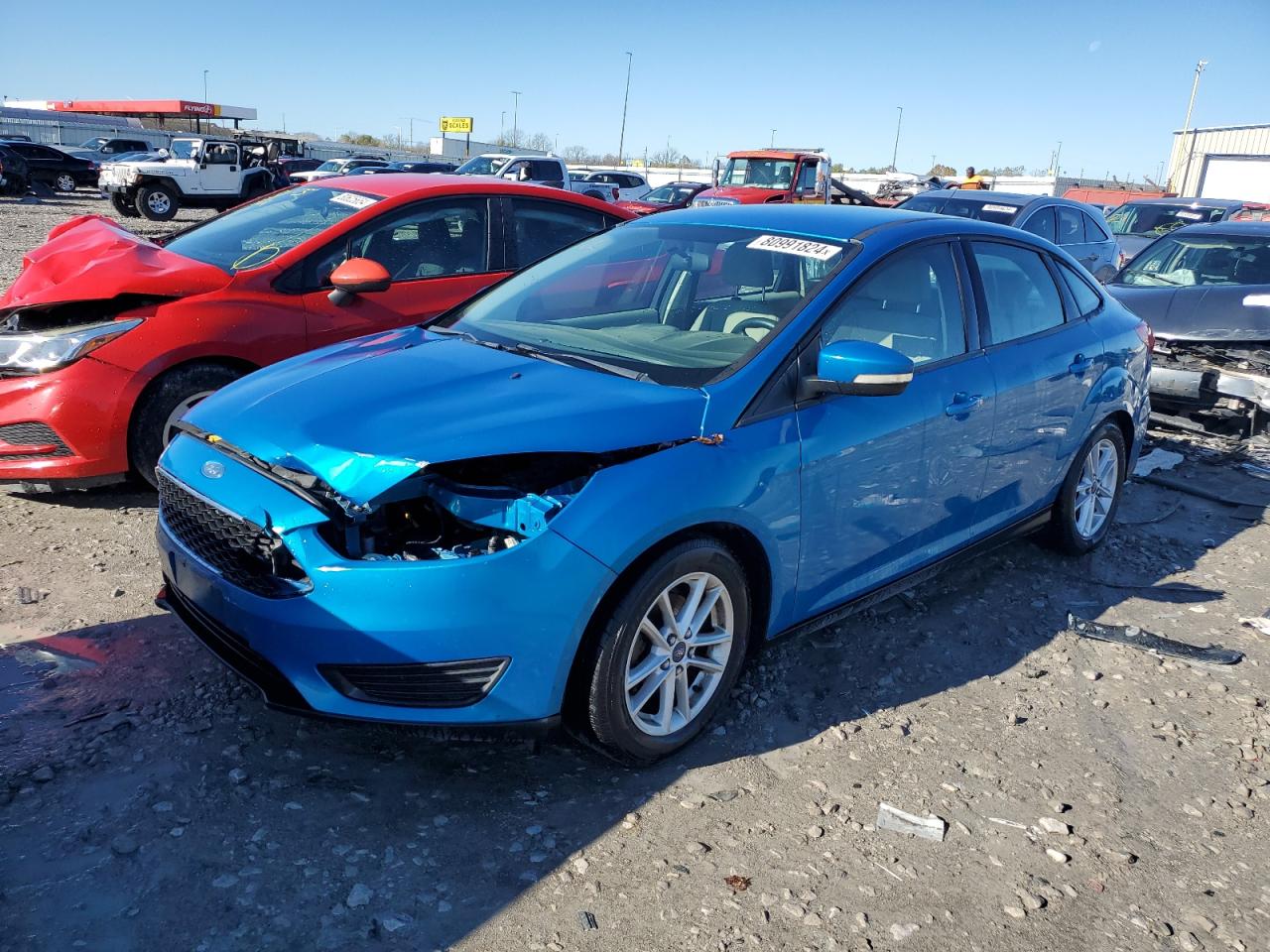 VIN 1FADP3F23FL259439 2015 FORD FOCUS no.1