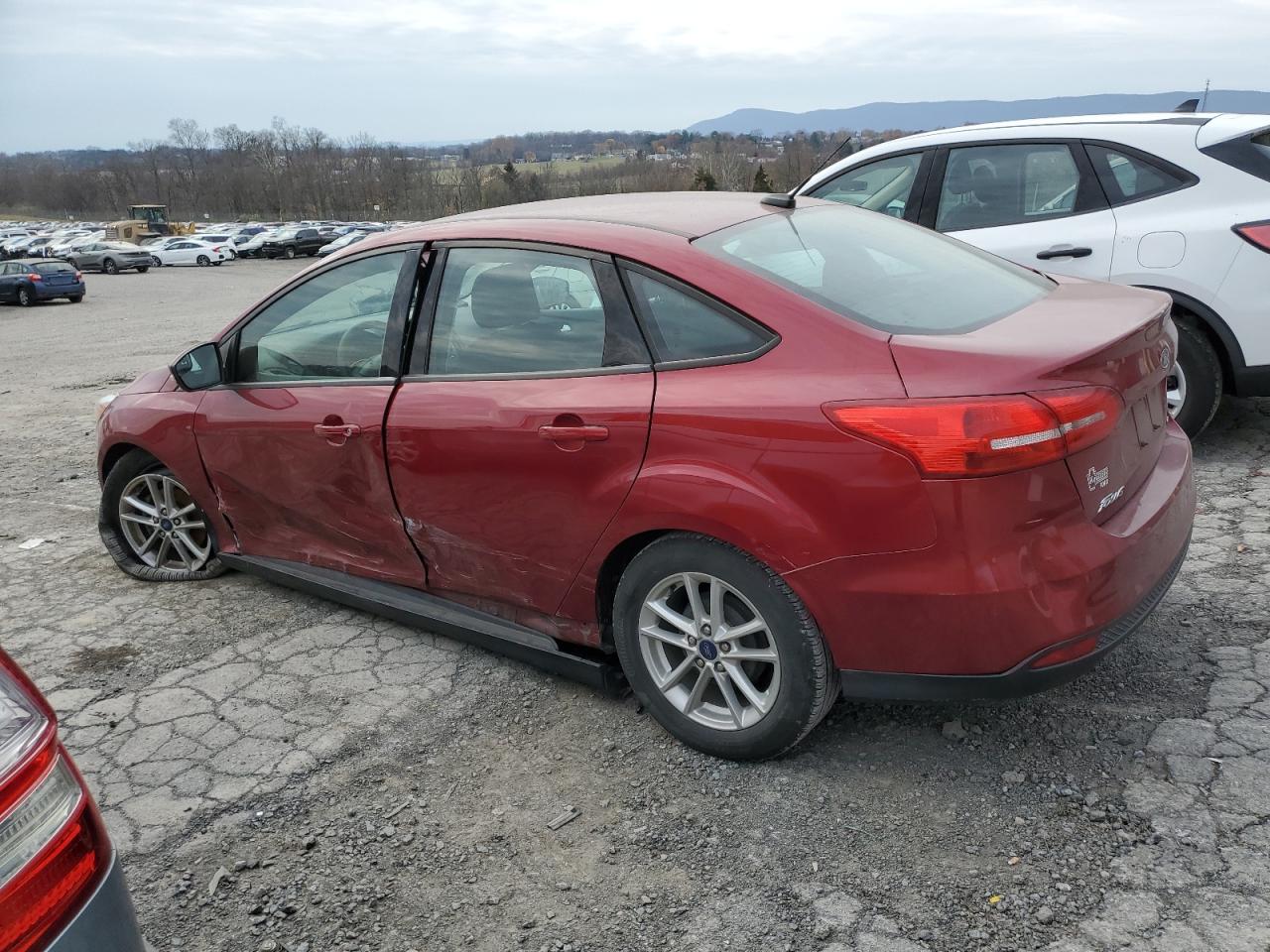 VIN 1FADP3F24GL318497 2016 FORD FOCUS no.2