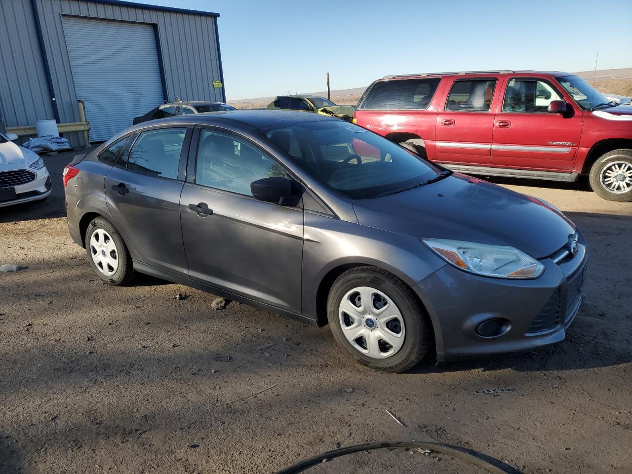 VIN 1FADP3E29EL236604 2014 FORD FOCUS no.4