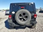 2011 Jeep Wrangler Unlimited Sahara продається в Hueytown, AL - Side