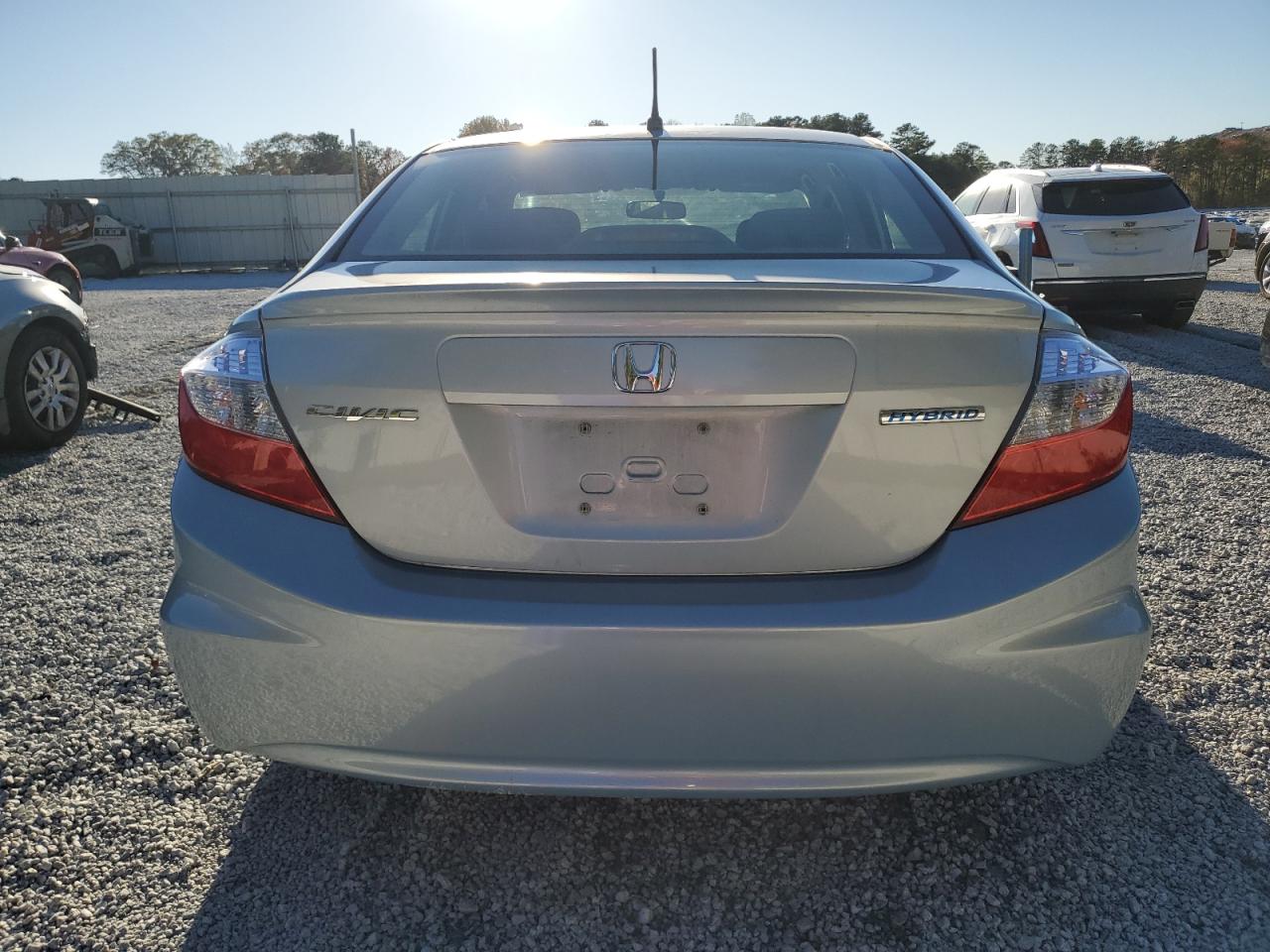 2012 Honda Civic Hybrid VIN: JHMFB4F28CS010836 Lot: 81689944