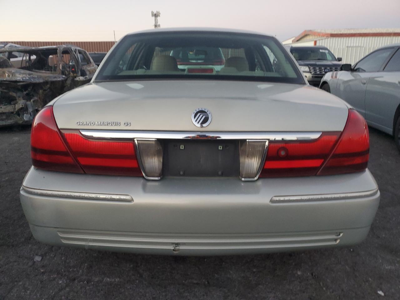 2003 Mercury Grand Marquis Gs VIN: 2MEFM74W73X677427 Lot: 78383464