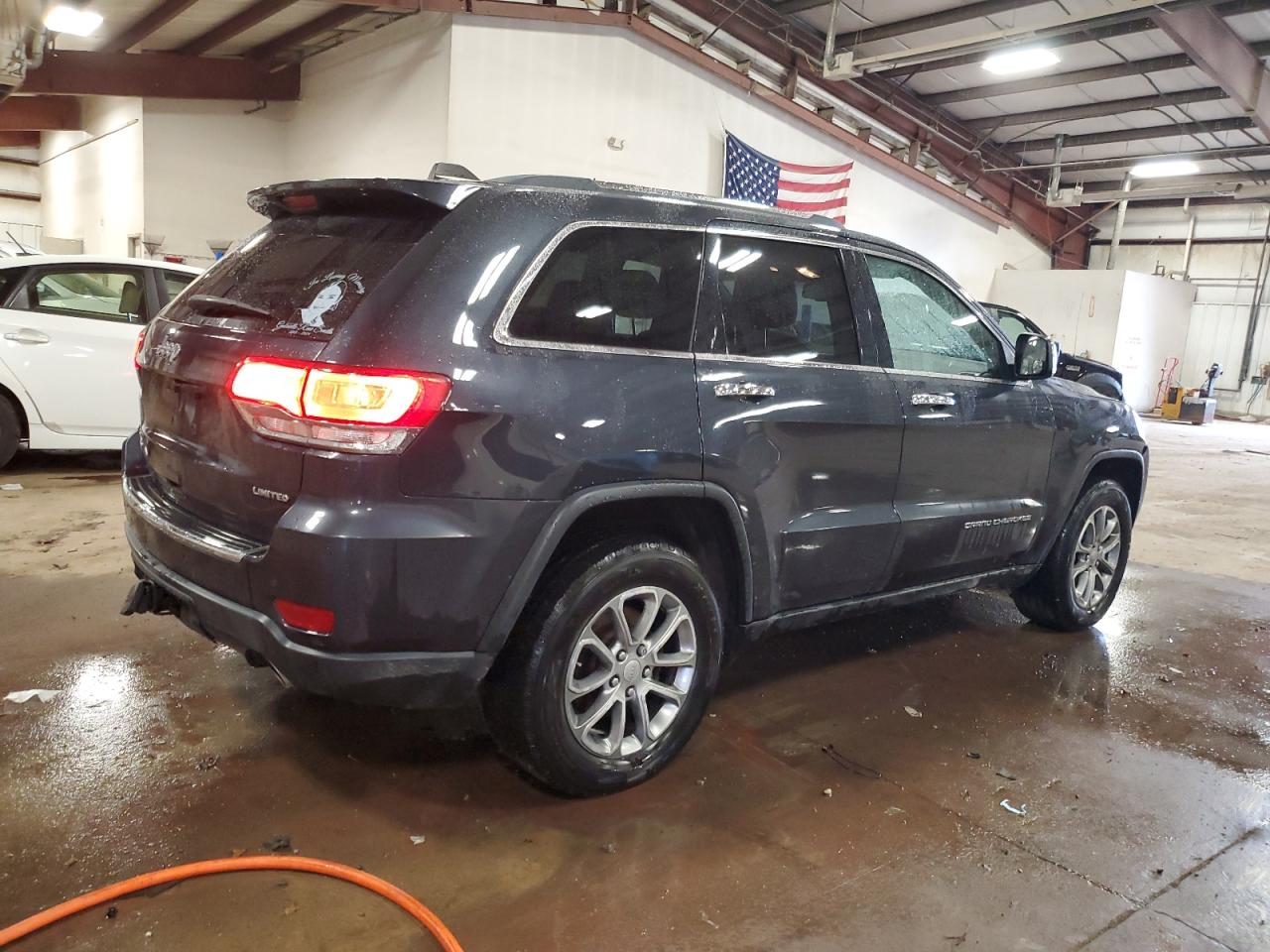 2014 Jeep Grand Cherokee - Image 3