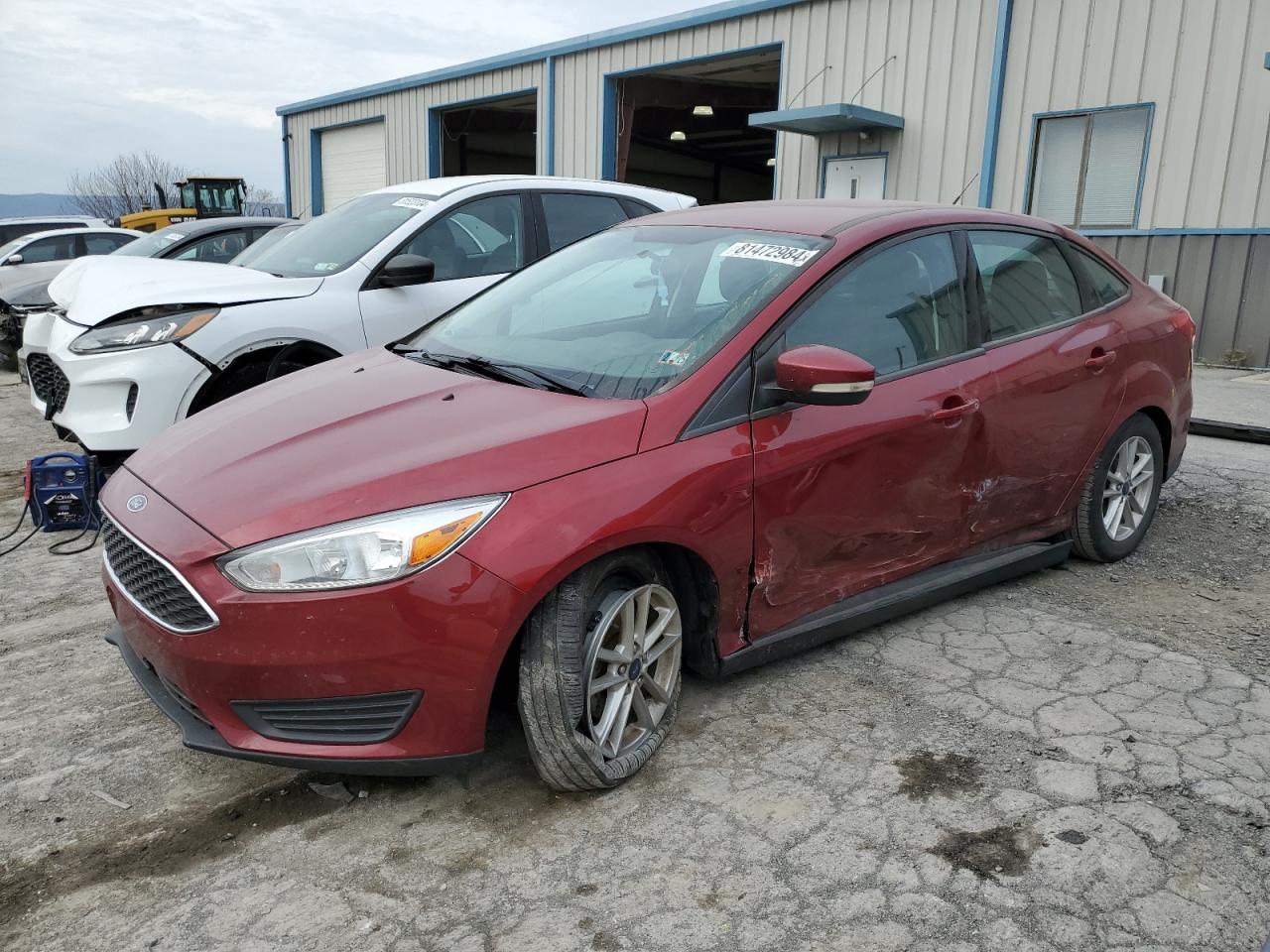 VIN 1FADP3F24GL318497 2016 FORD FOCUS no.1