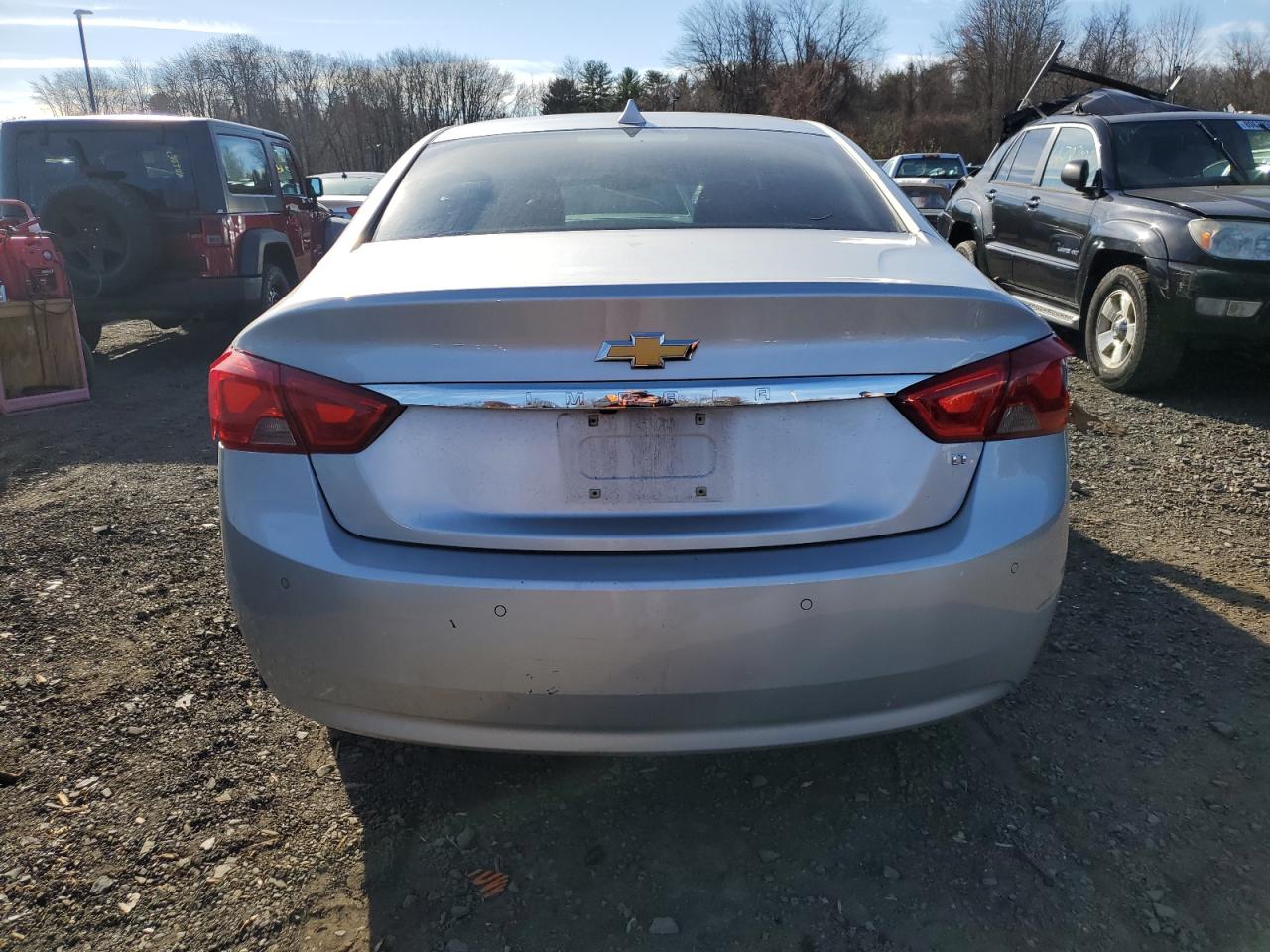 2014 Chevrolet Impala Lt VIN: 1G1125S31EU129490 Lot: 80890934