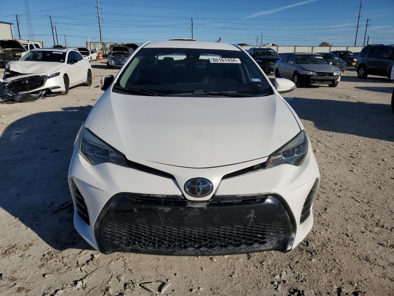 VIN 5YFBURHE4KP895180 2019 TOYOTA COROLLA no.5