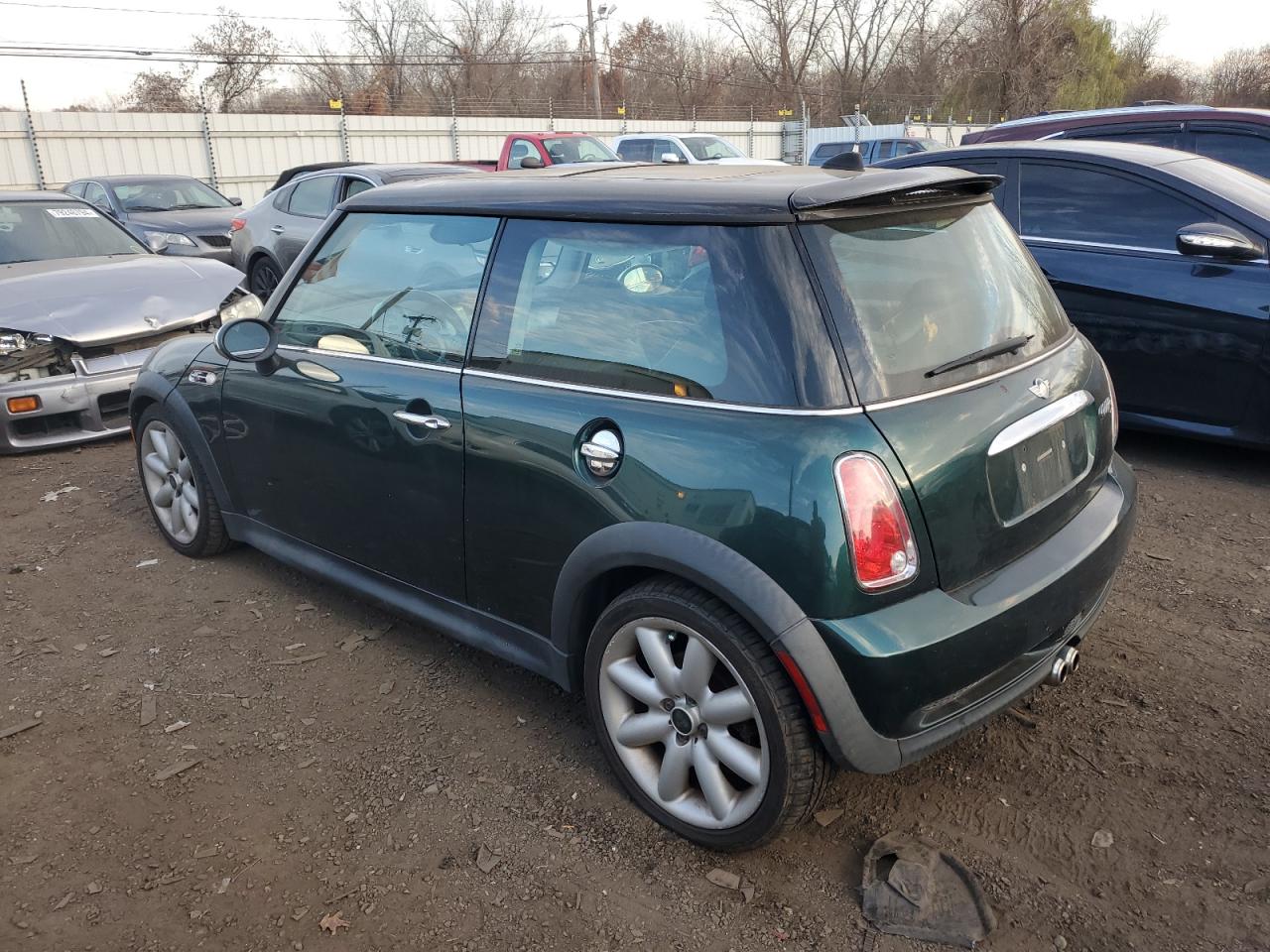 2006 Mini Cooper S VIN: WMWRE33536TJ38833 Lot: 79332534