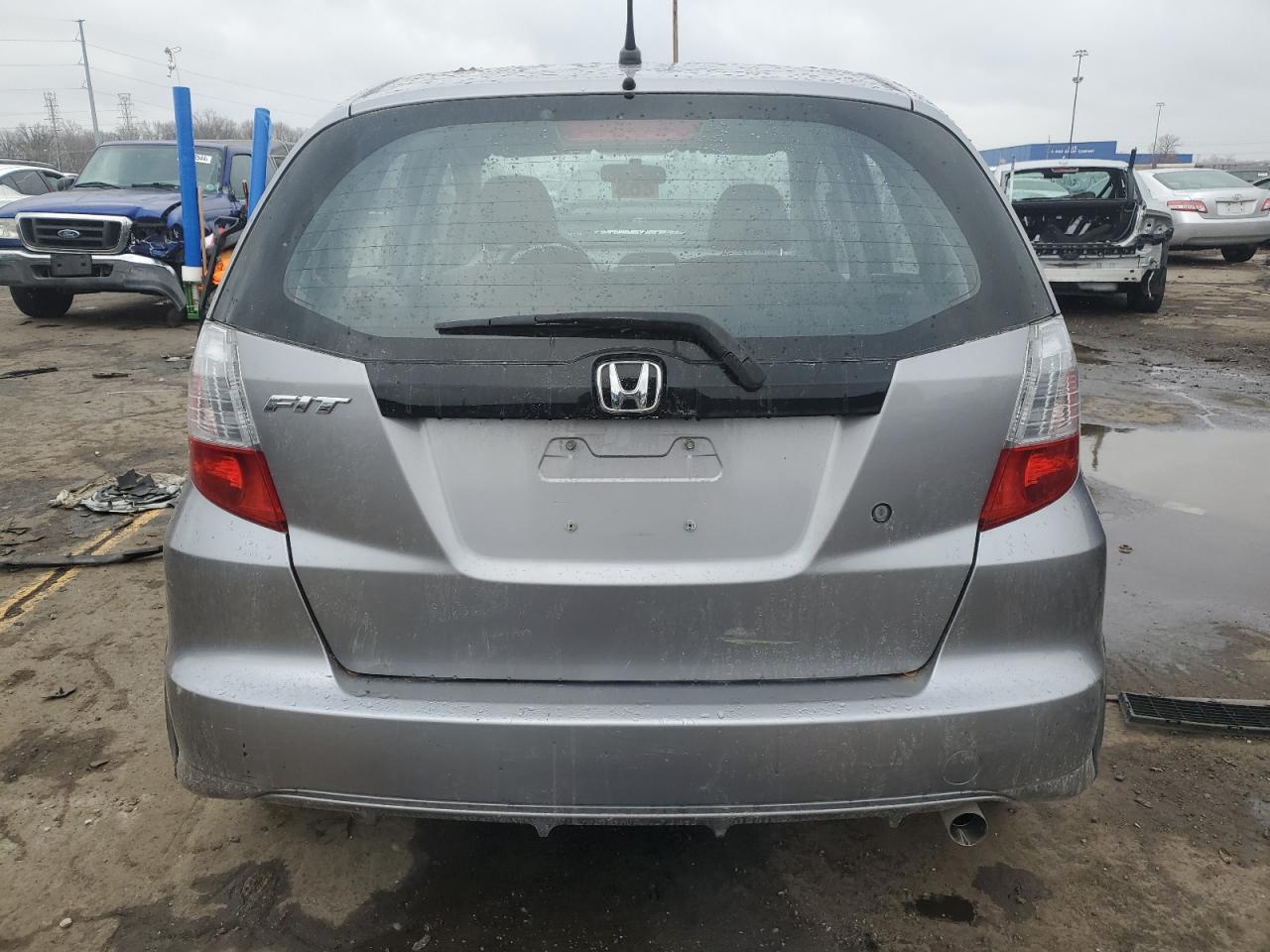 2009 Honda Fit VIN: JHMGE87229S048010 Lot: 81489604