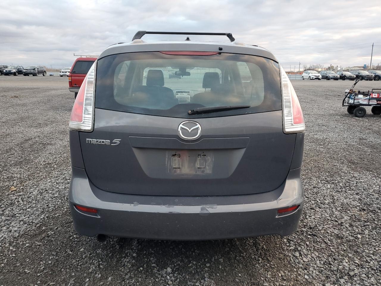 2009 Mazda 5 VIN: JM1CR293690328712 Lot: 80659434