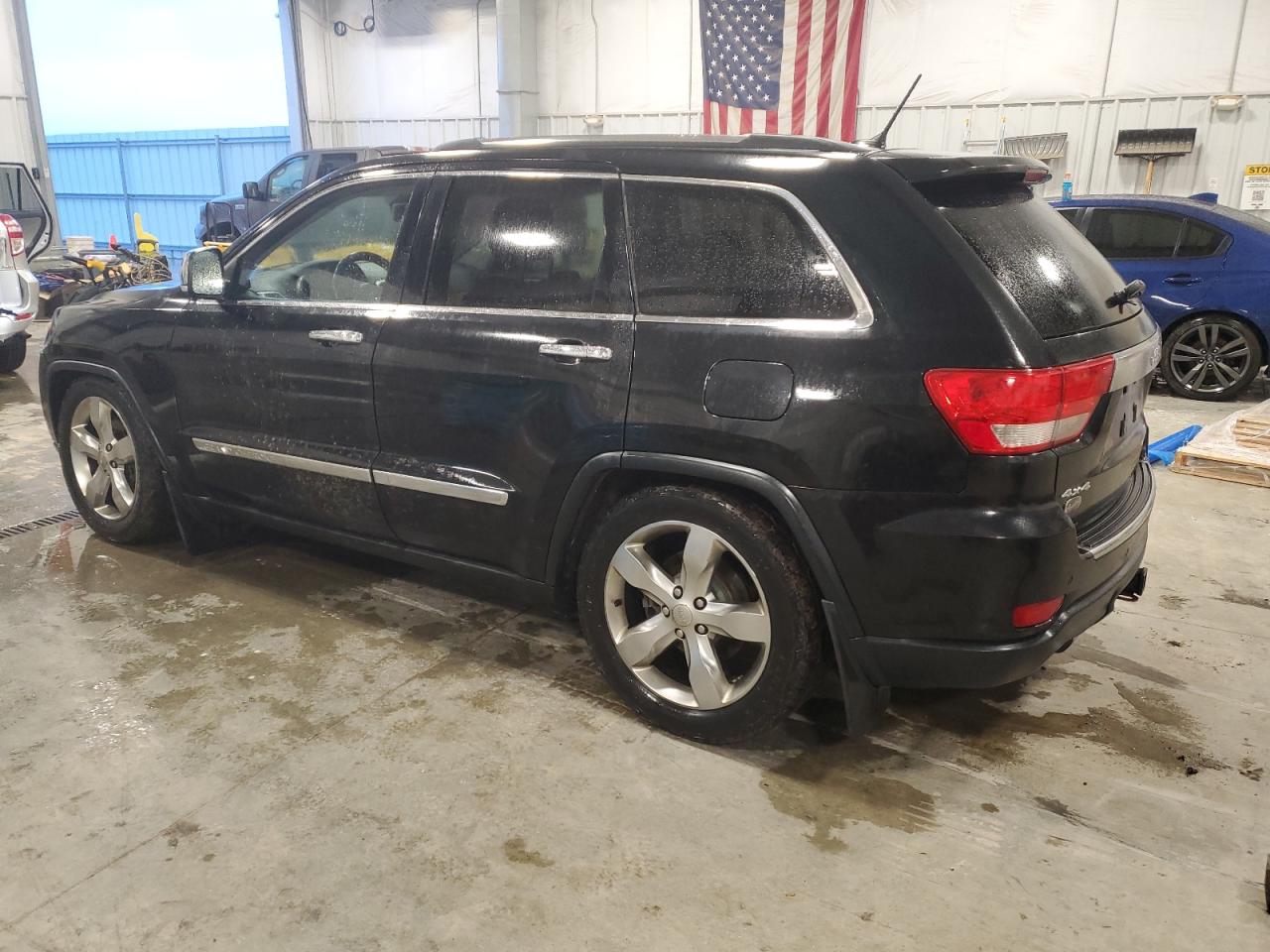 2013 Jeep Grand Cherokee - Image 2