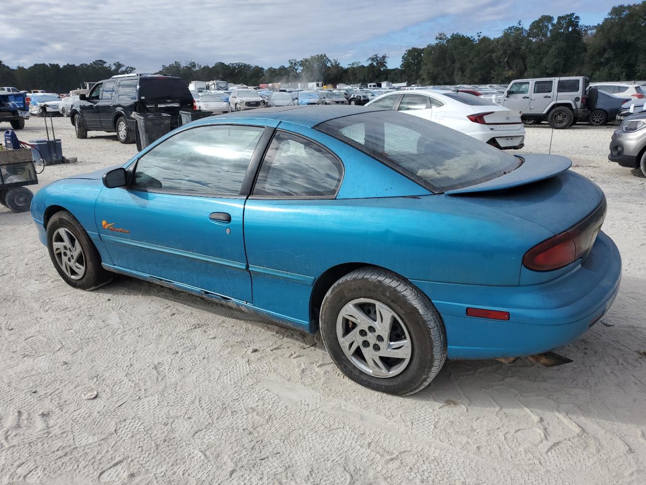 1999 Pontiac Sunfire Se VIN: 1G2JB124XX7563650 Lot: 82518154