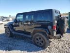 2011 Jeep Wrangler Unlimited Sahara продається в Hueytown, AL - Side