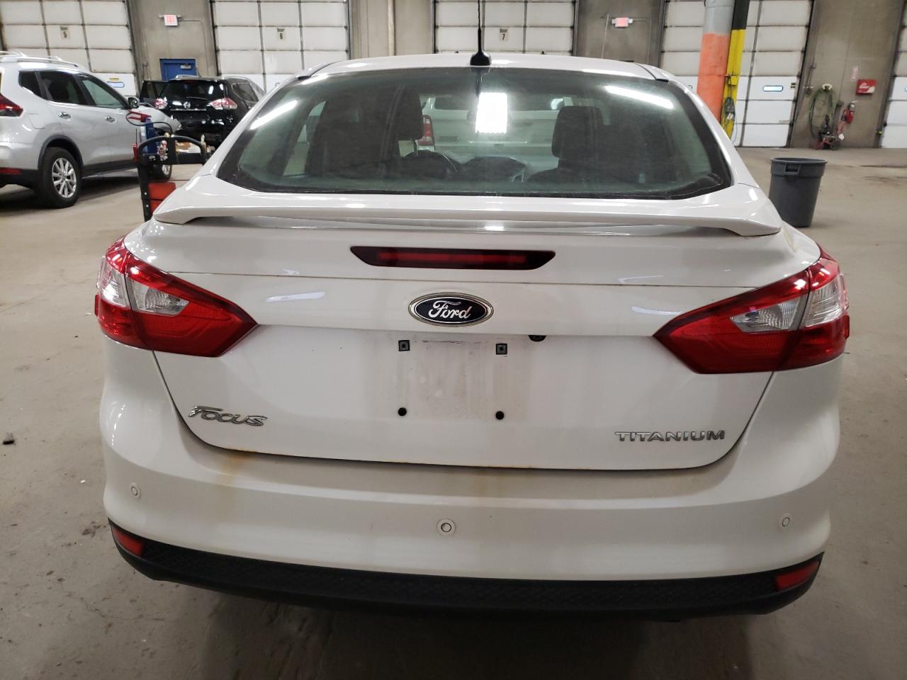 2012 Ford Focus Titanium VIN: 1FAHP3J29CL284978 Lot: 80454884