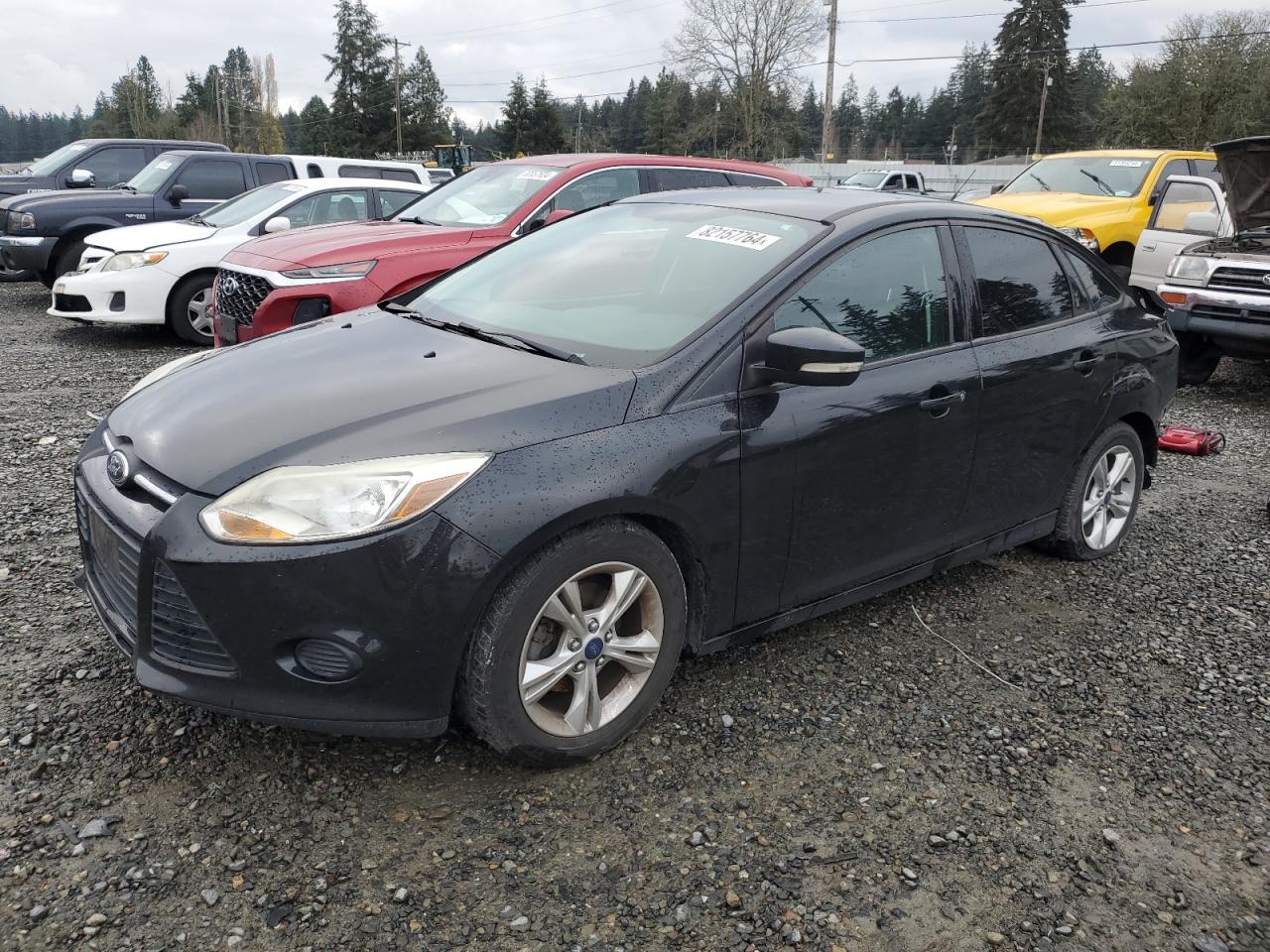 VIN 1FADP3F20EL176887 2014 FORD FOCUS no.1