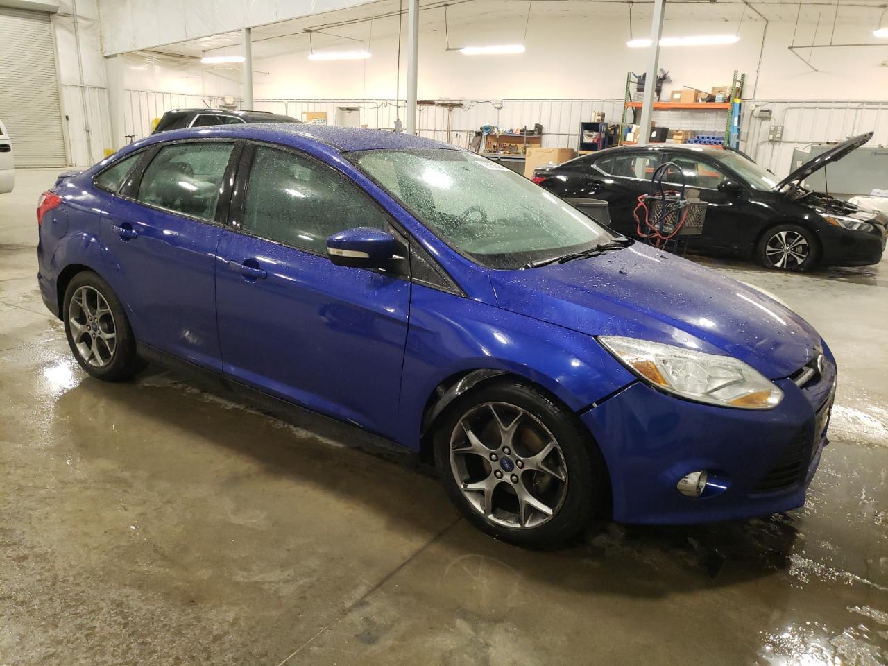 VIN 1FADP3F20EL406928 2014 FORD FOCUS no.4