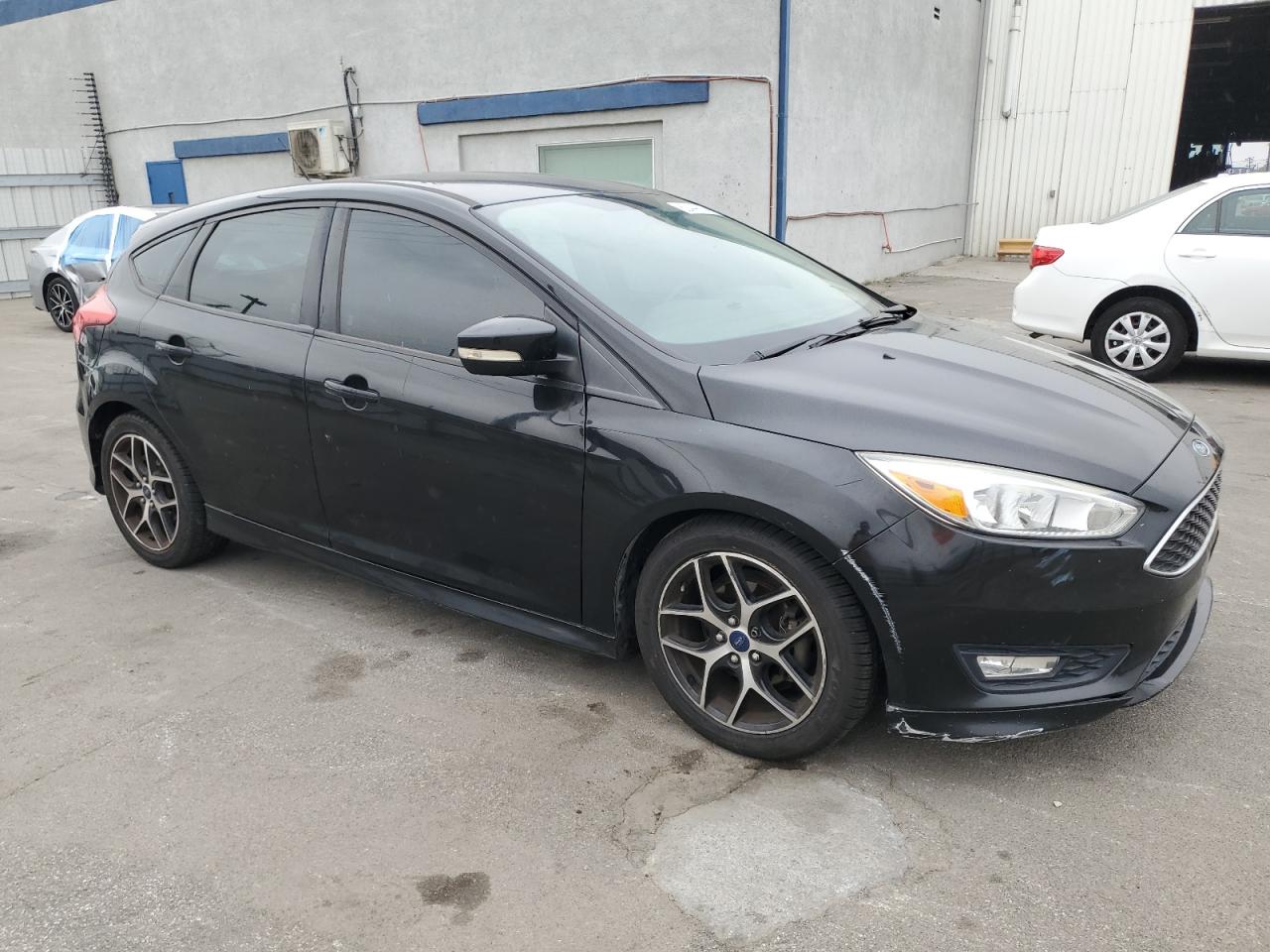 VIN 1FADP3K2XFL385724 2015 FORD FOCUS no.4