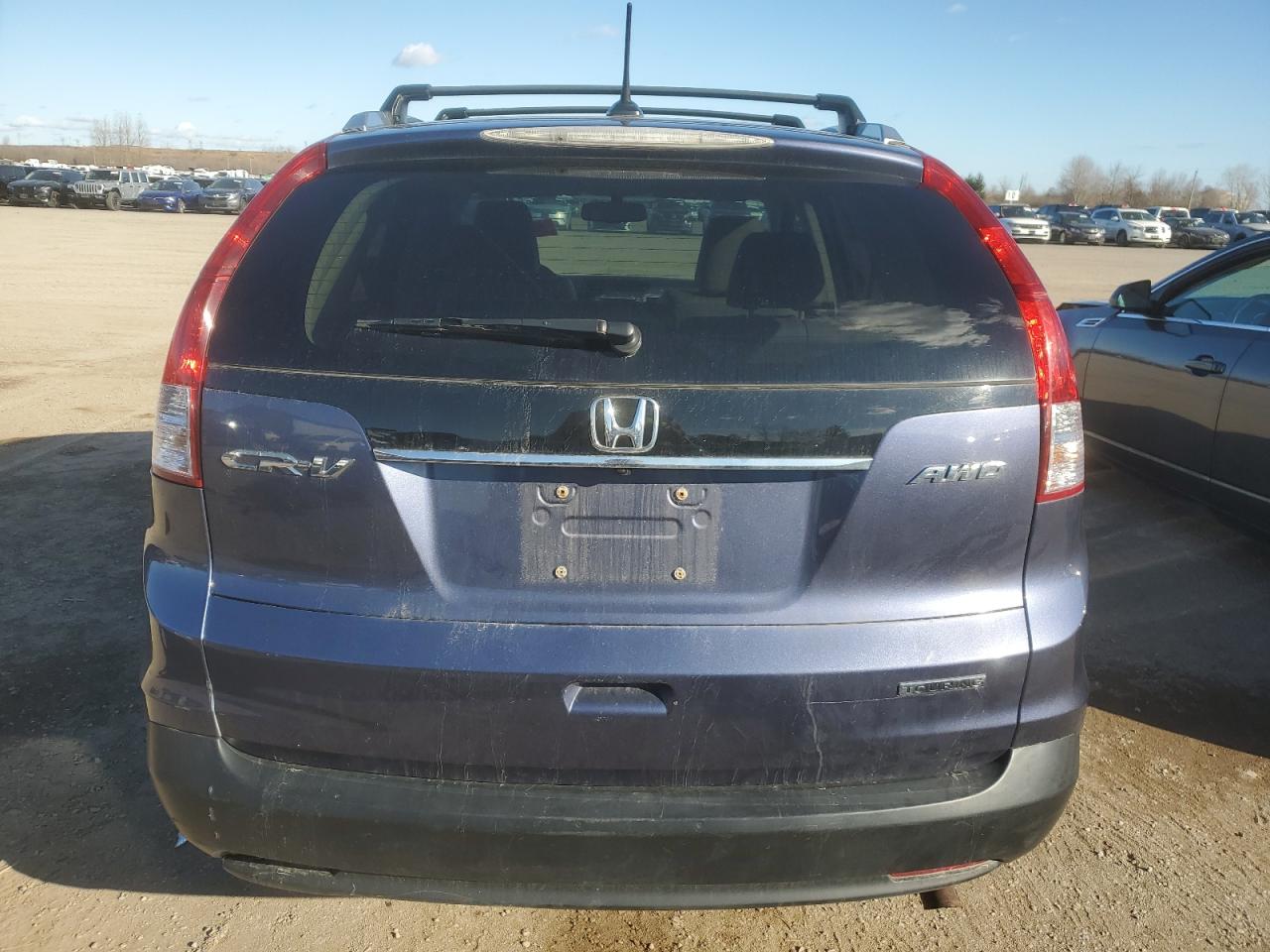 2012 Honda Cr-V Touring VIN: 5J6RM4H98CL801763 Lot: 81080544