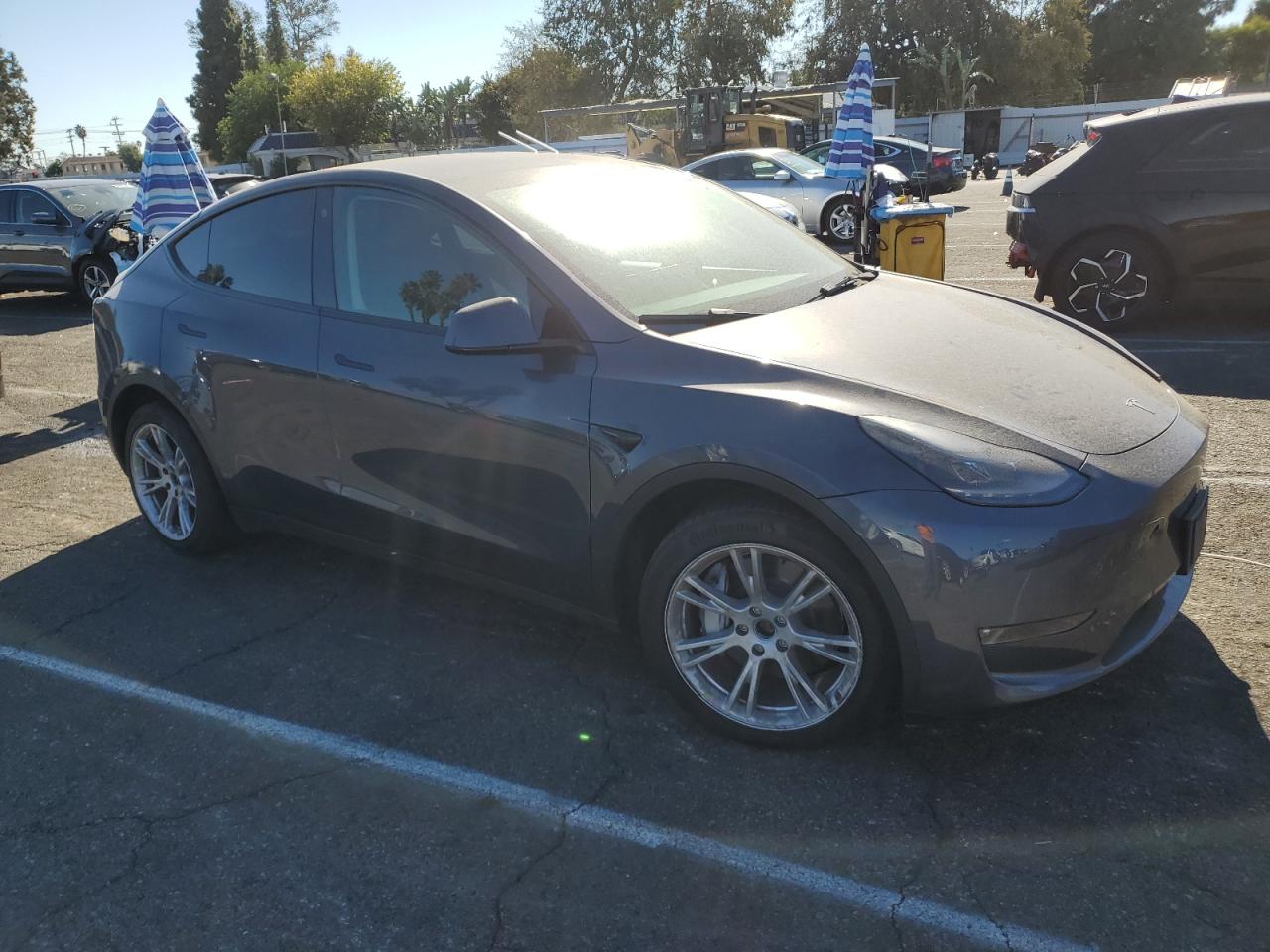 VIN 7SAYGDEE4PF606670 2023 TESLA MODEL Y no.4