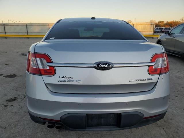 Седани FORD TAURUS 2012 Сріблястий