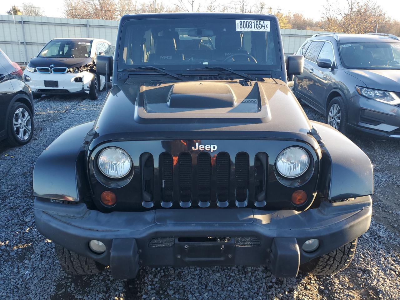 2012 Jeep Wrangler Unlimited Rubicon VIN: 1C4HJWFG1CL221083 Lot: 80081654