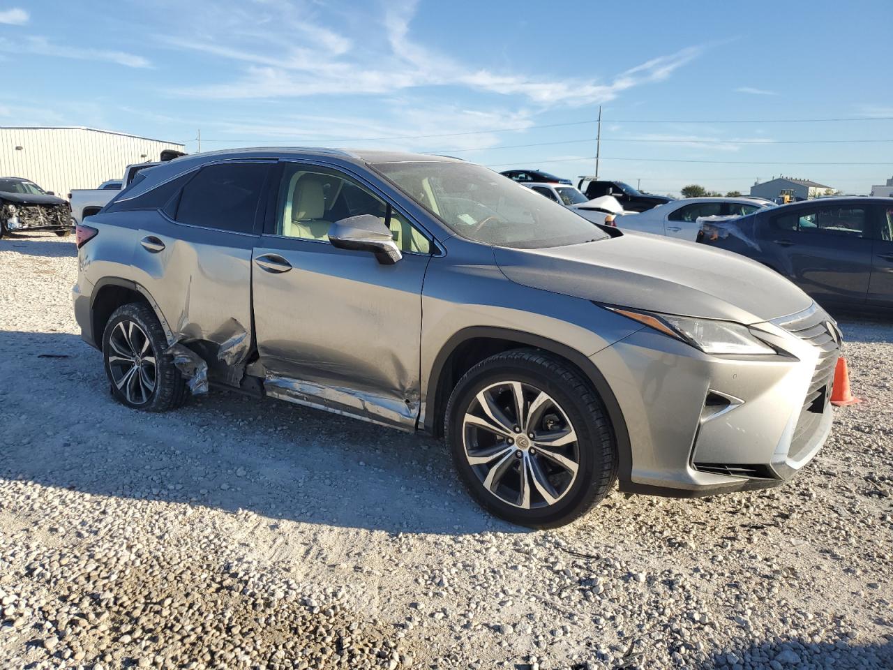 VIN 2T2ZZMCAXHC091834 2017 LEXUS RX350 no.4