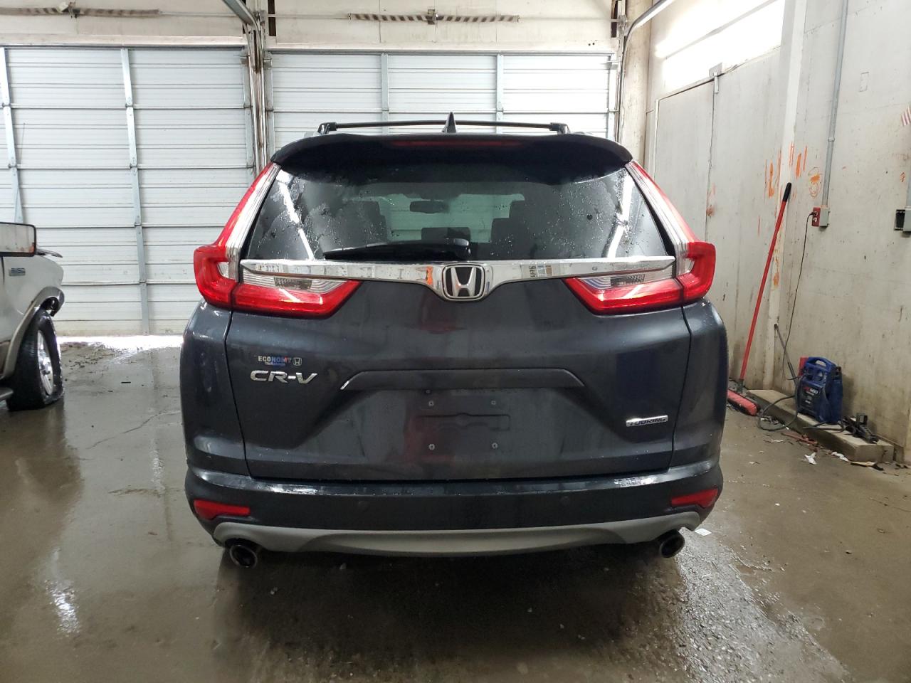 2017 Honda Cr-V Touring VIN: 7FARW1H98HE034848 Lot: 79552384