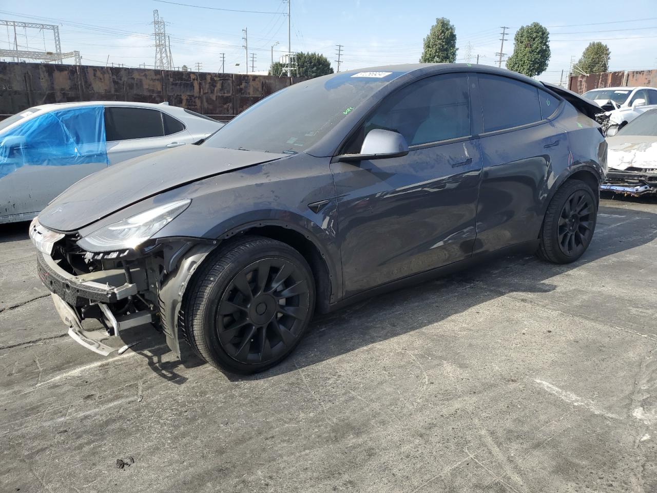 VIN 7SAYGDEE0NF360021 2022 TESLA MODEL Y no.1