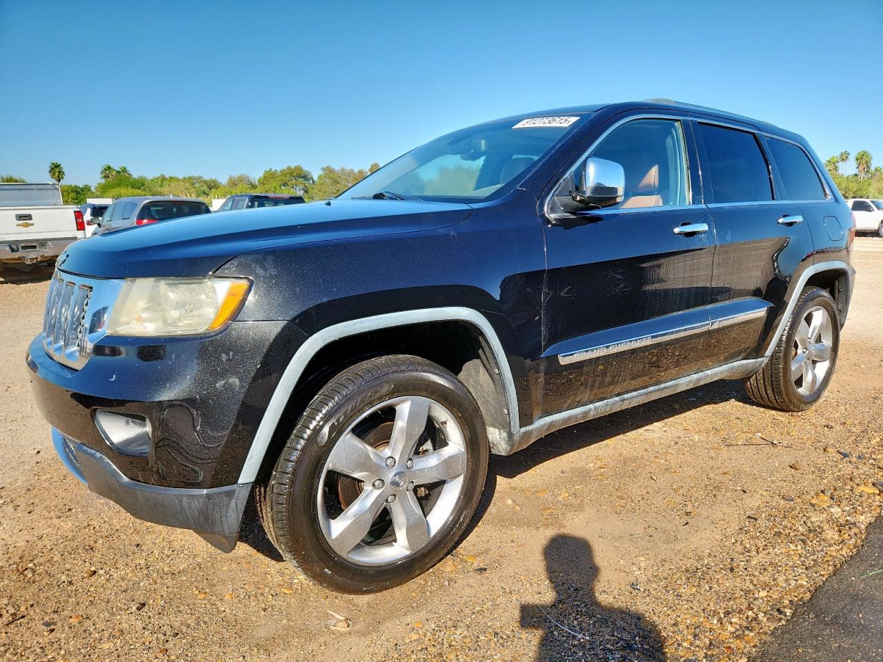 2011 Jeep Grand Cherokee Overland black suv flexible 1J4RR6GG0BC641776 photo #1