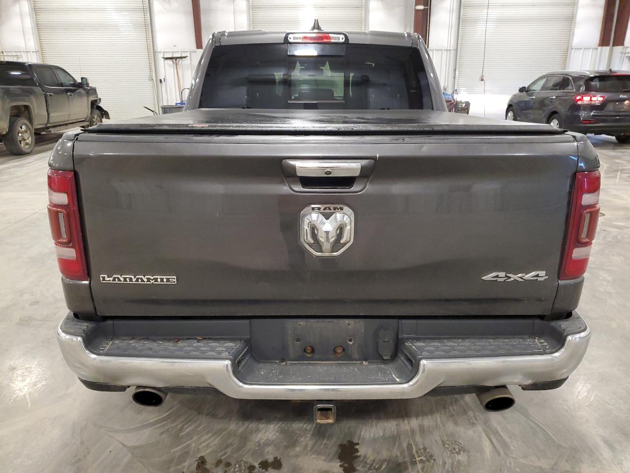 2019 Ram 1500 Laramie VIN: 1C6SRFJT7KN736148 Lot: 91296005
