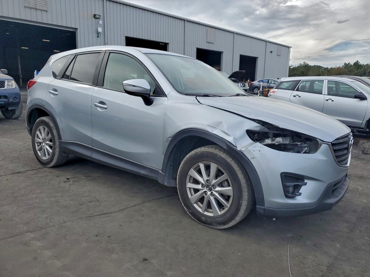 2016 Mazda Cx-5 Touring VIN: JM3KE4CY9G0606014 Lot: 94115855