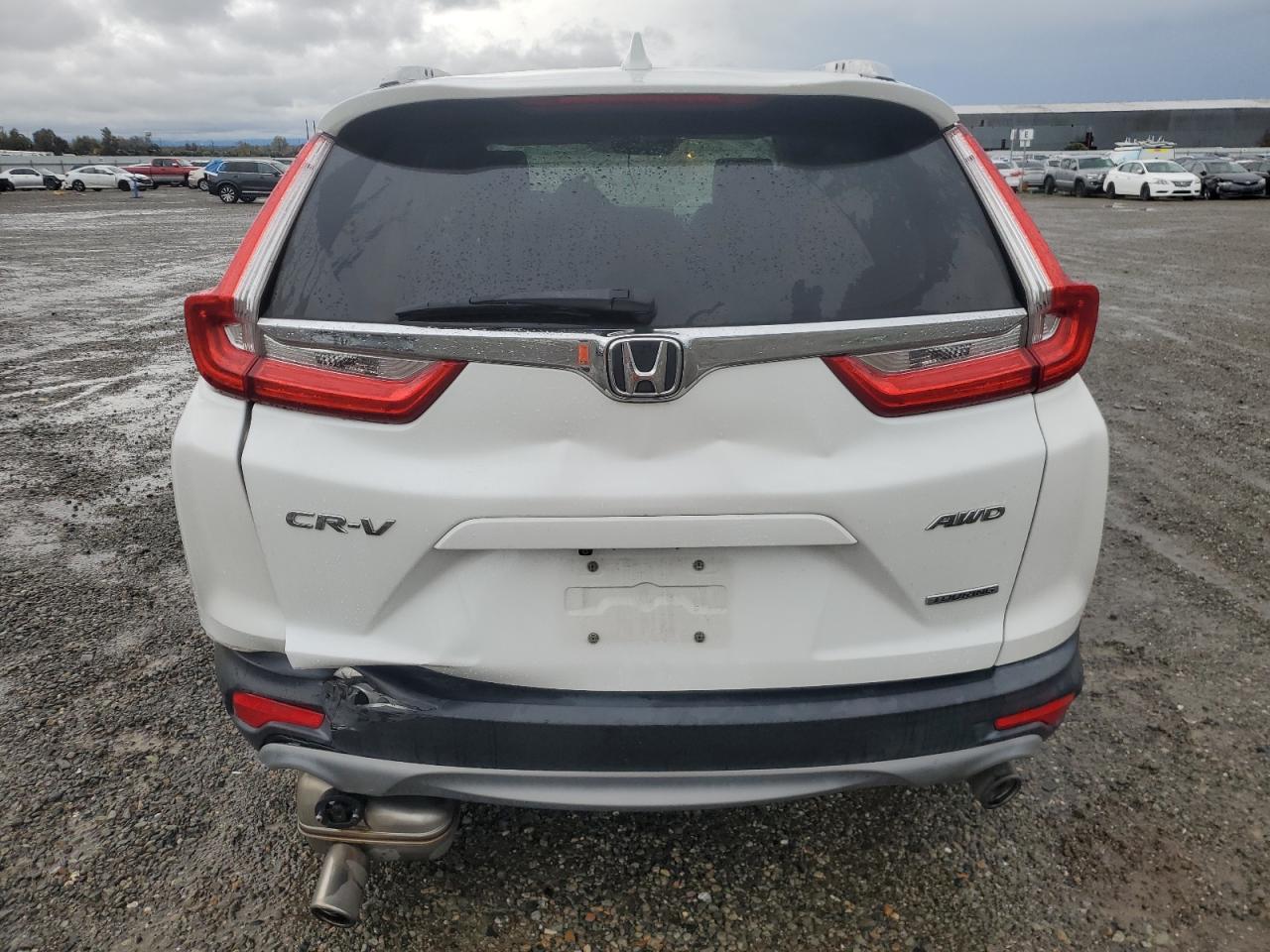 2019 Honda Cr-V Touring VIN: 7FARW2H99KE029137 Lot: 92919375