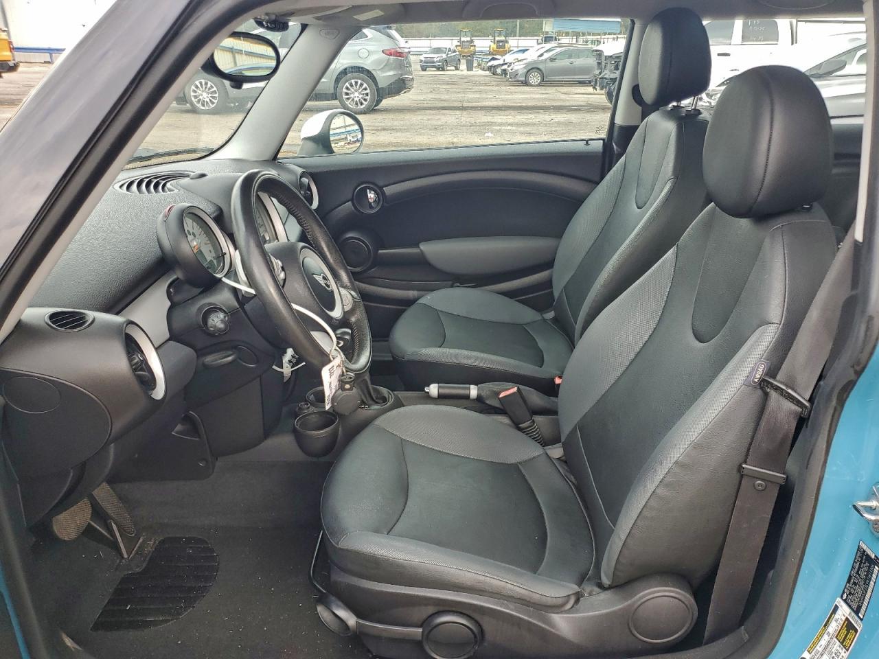 2009 Mini Cooper VIN: WMWMF33599TW73306 Lot: 93346345