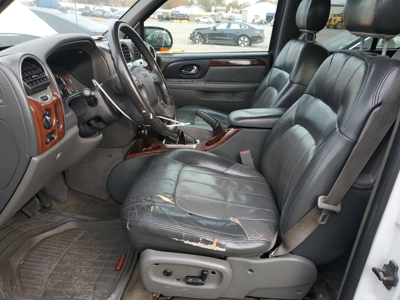 2003 GMC Envoy VIN: 1GKDT13SX32324095 Lot: 91772125