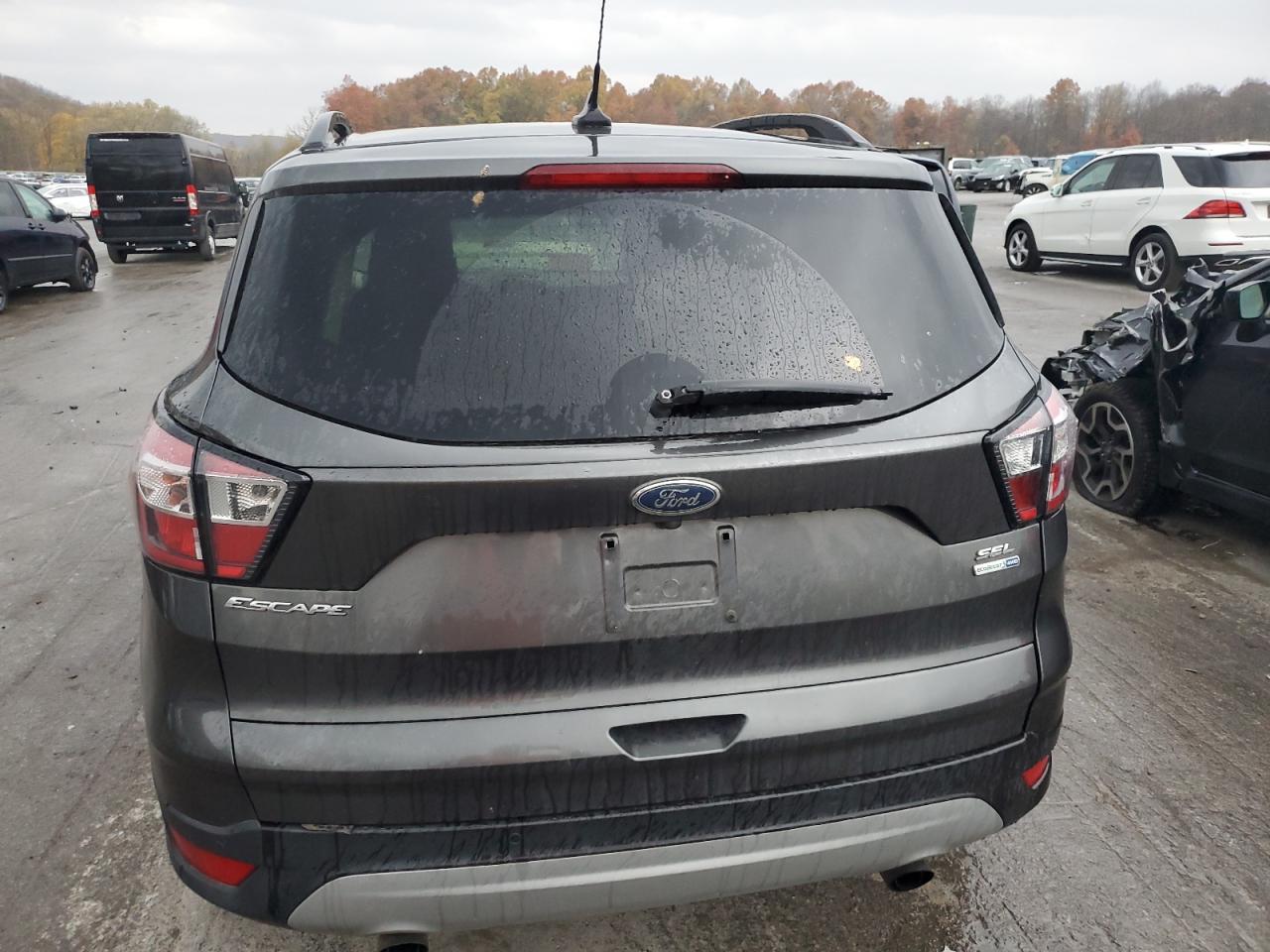 2018 Ford Escape Sel VIN: 1FMCU9HD5JUC21063 Lot: 90983535