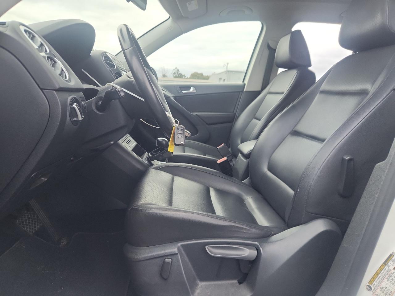 2014 Volkswagen Tiguan S VIN: WVGAV3AX8EW559704 Lot: 91932475