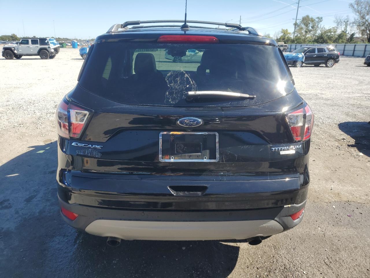 2017 Ford Escape Titanium VIN: 1FMCU0J94HUC60142 Lot: 92381175