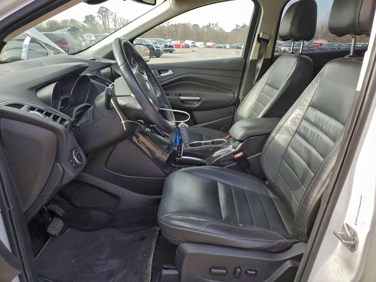 2016 Ford Escape Titanium VIN: 1FMCU0JX0GUA63224 Lot: 94170275