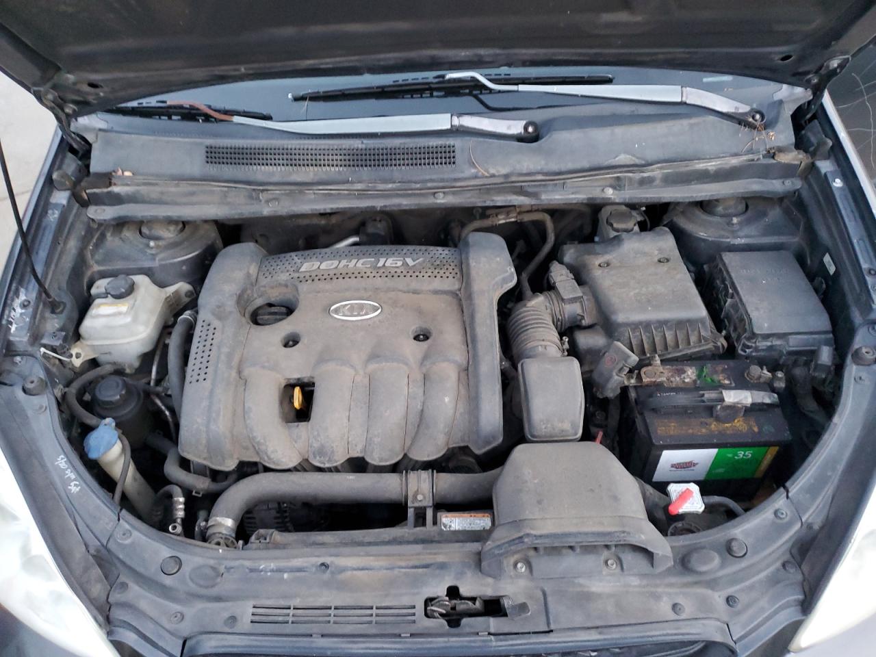 2007 Kia Rondo Base VIN: KNAFG525177052618 Lot: 93727455