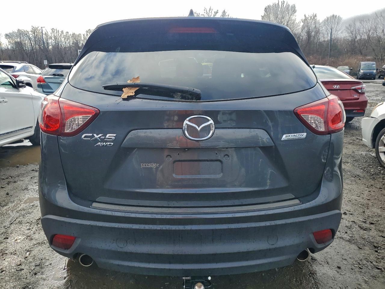 2015 Mazda Cx-5 Touring VIN: JM3KE4CY5F0463500 Lot: 92999825