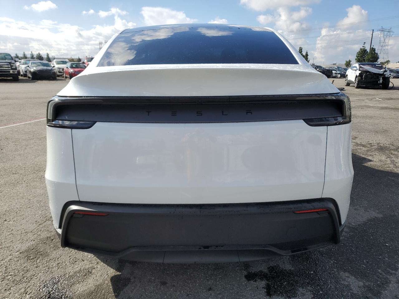 2026 Tesla Model Y VIN: 7SAYGDED7TF419800 Lot: 93335665