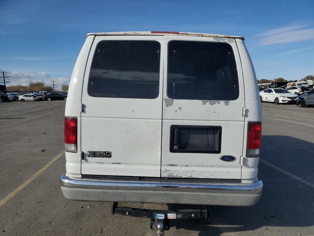 2000 Ford Econoline E350 Super Duty Wagon VIN: 1FBSS31S9YHB35449 Lot: 91883415