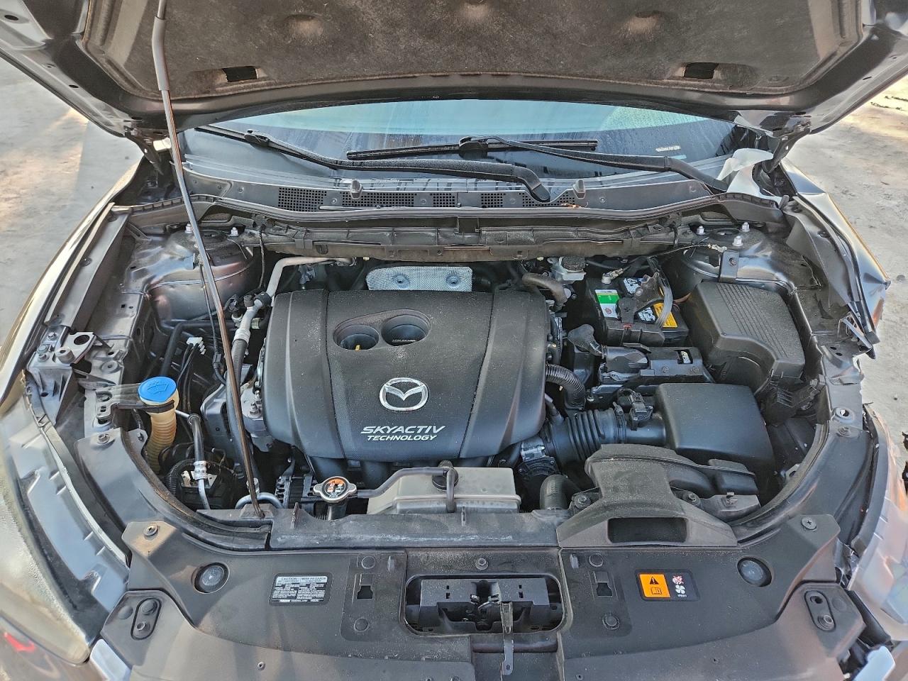 2016 Mazda Cx-5 Sport VIN: JM3KE2BY2G0877583 Lot: 94117645